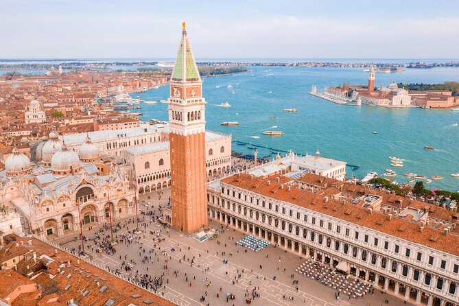 Aerial view of St. Mark's Square in Venice, featuring the bell tower and st. Mark's Basilica