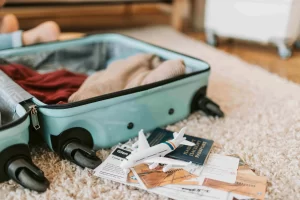 An open suitcase that is being prepared for long term travel packing