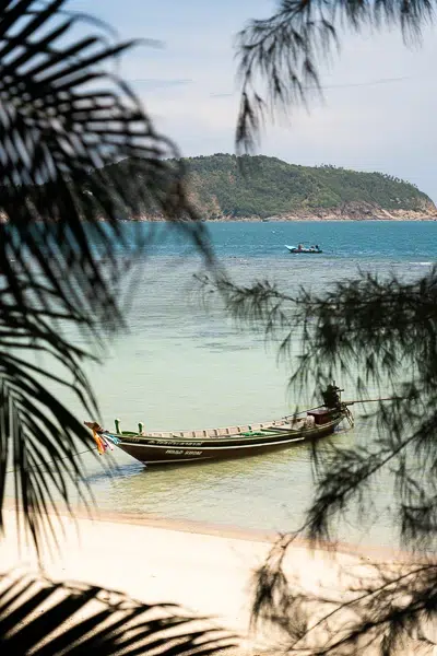 Long tail boat on Hadd Khom beach in Koh Phangan, Thailand